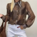 camicia semi trasparente con applicazioni bijoux
